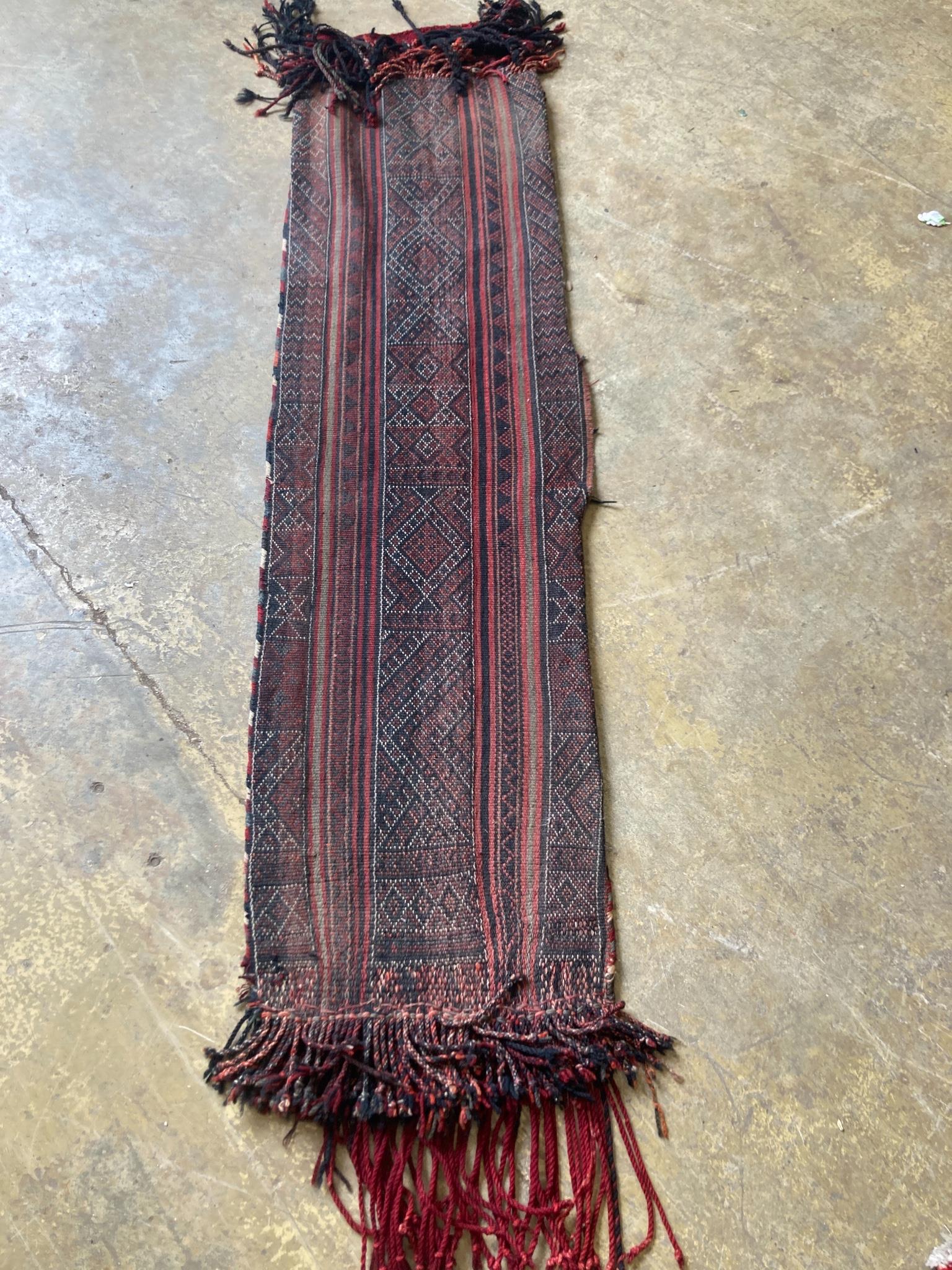 An Afghan saddle rug